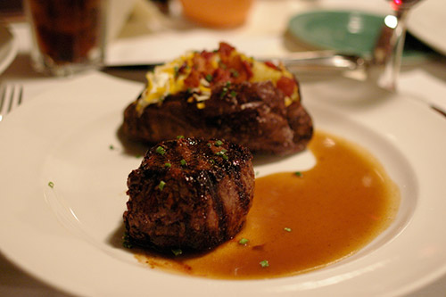 fillet mignon and a baked potato main entree